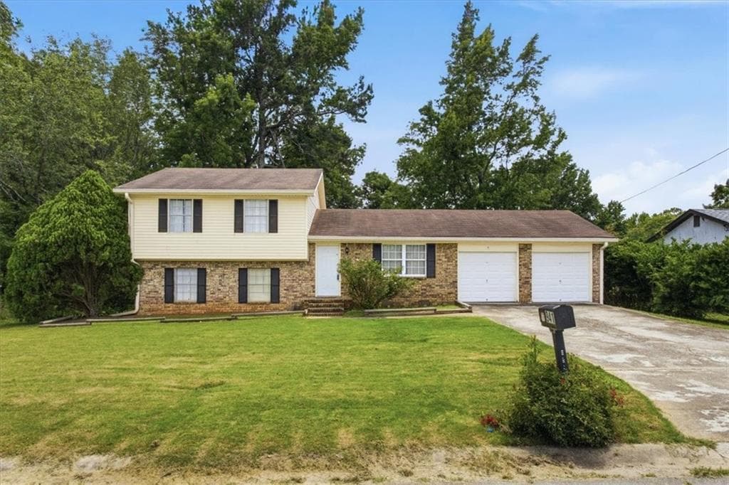 5 bedroom, 2 bathroom, 1,682 sq ft single family residence under contract at 941 Cochise Trail, Conyers, GA 30094 — photo 2
