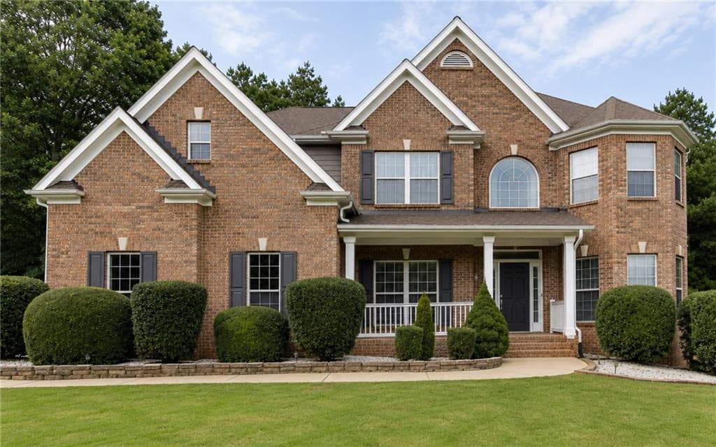 7 bedroom, 6 bathroom, 5,926 sq ft single family residence for sale at 3459 Lake Mill Road, Buford, GA 30519