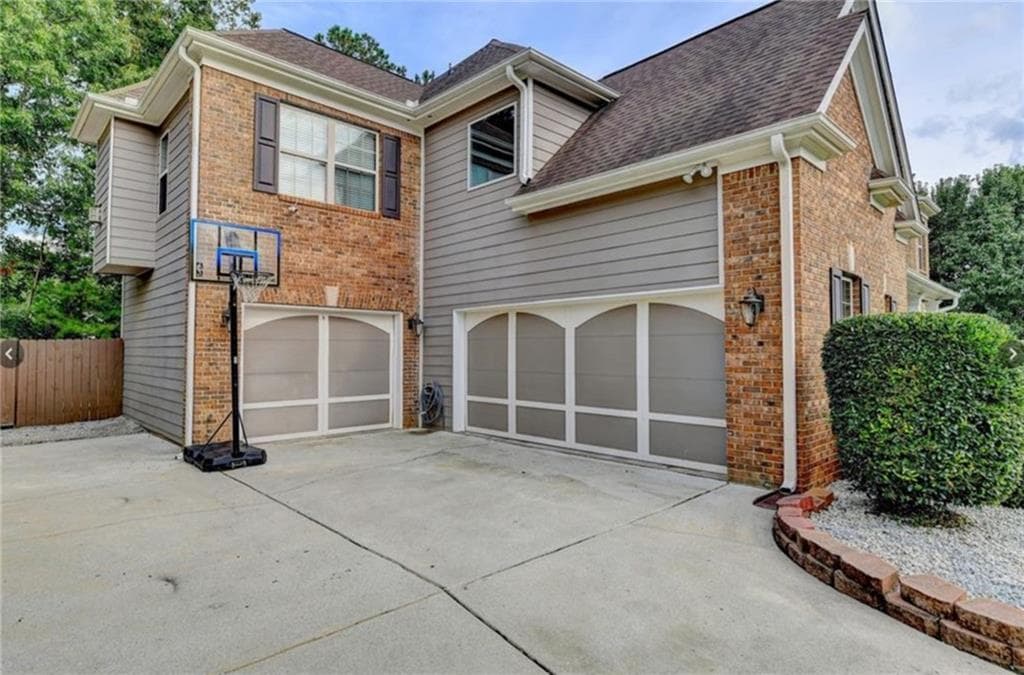 7 bedroom, 6 bathroom, 5,926 sq ft single family residence for sale at 3459 Lake Mill Road, Buford, GA 30519 — photo 3