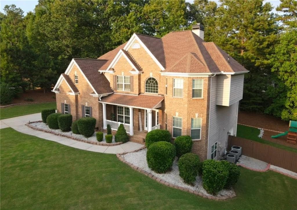 7 bedroom, 6 bathroom, 5,926 sq ft single family residence for sale at 3459 Lake Mill Road, Buford, GA 30519 — photo 4