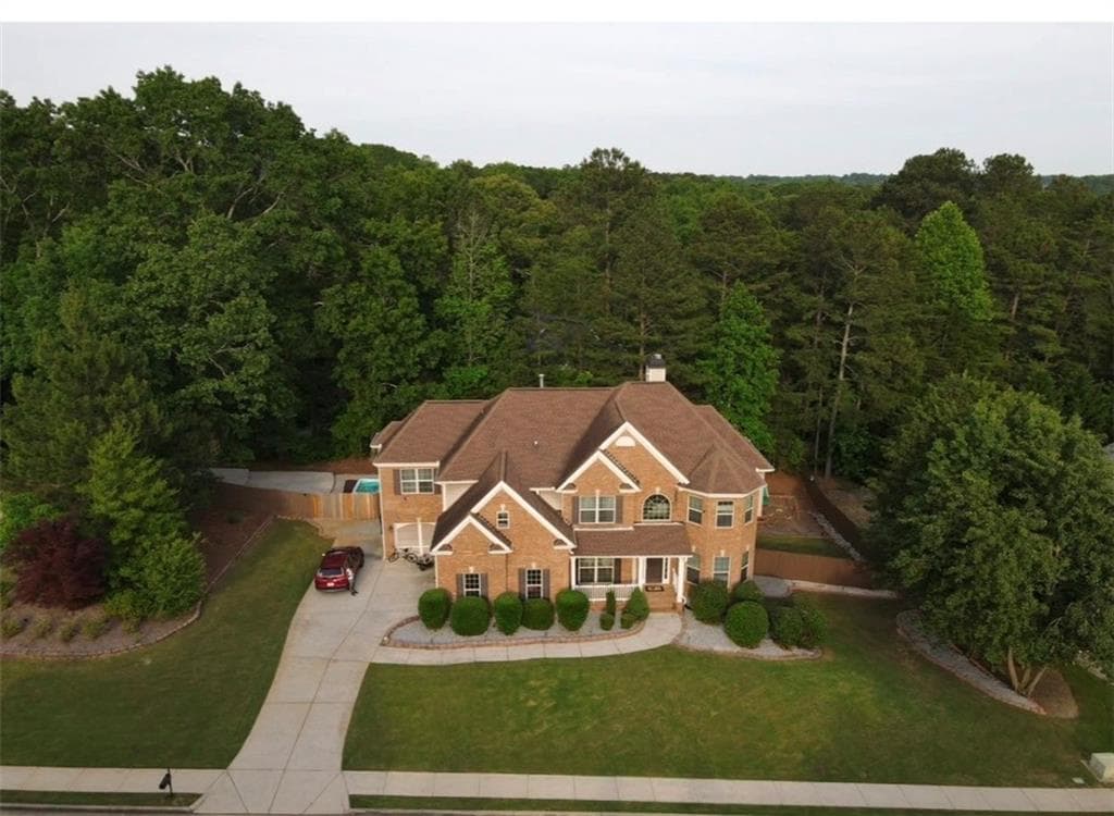 7 bedroom, 6 bathroom, 5,926 sq ft single family residence for sale at 3459 Lake Mill Road, Buford, GA 30519 — photo 5