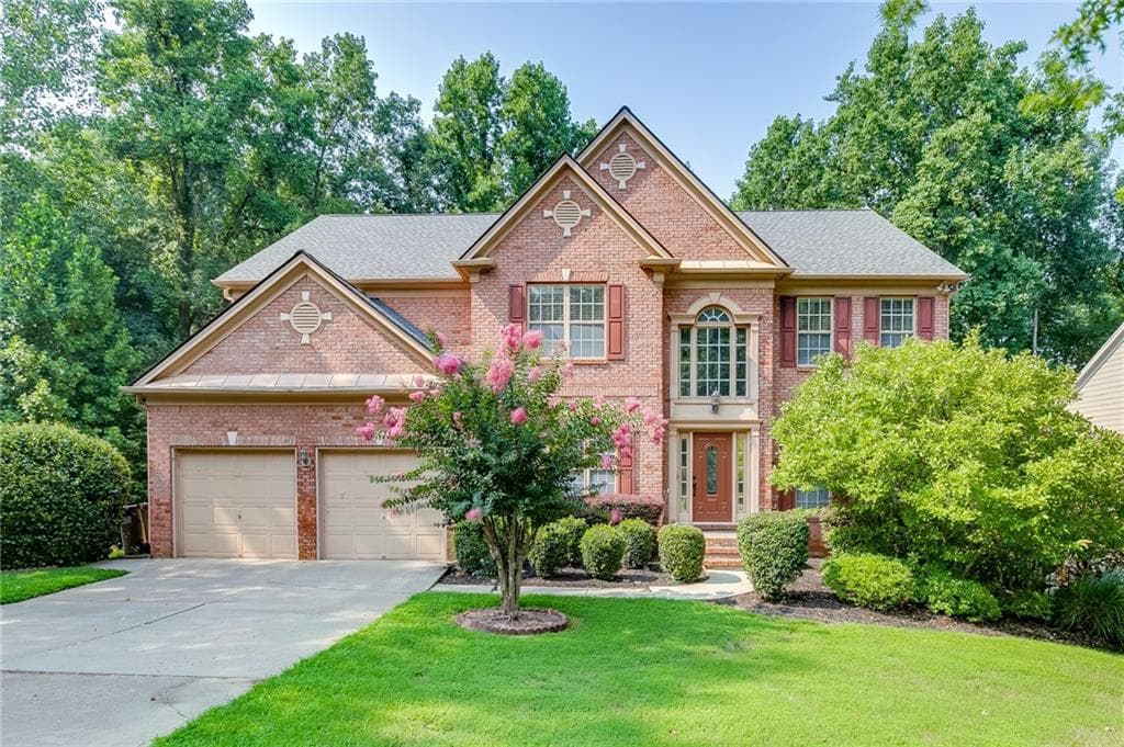 7 bedroom, 5 bathroom, 5,152 sq ft single family residence for sale at 1620 Alvecote Court, Cumming, GA 30041