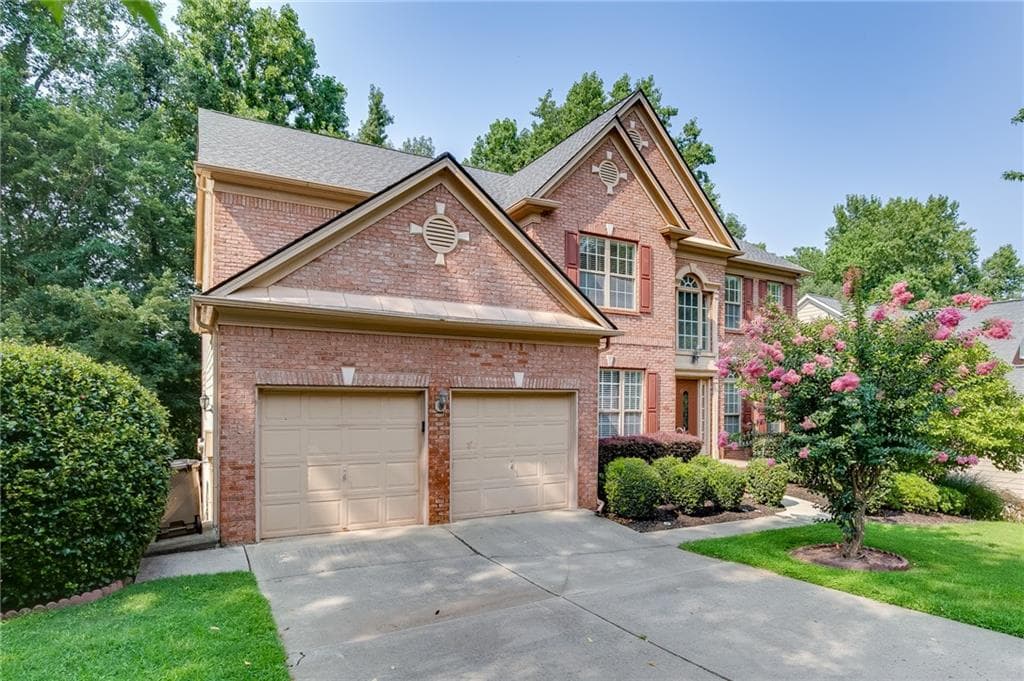 7 bedroom, 5 bathroom, 5,152 sq ft single family residence for sale at 1620 Alvecote Court, Cumming, GA 30041 — photo 2