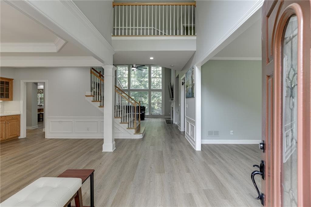 7 bedroom, 5 bathroom, 5,152 sq ft single family residence for sale at 1620 Alvecote Court, Cumming, GA 30041 — photo 4