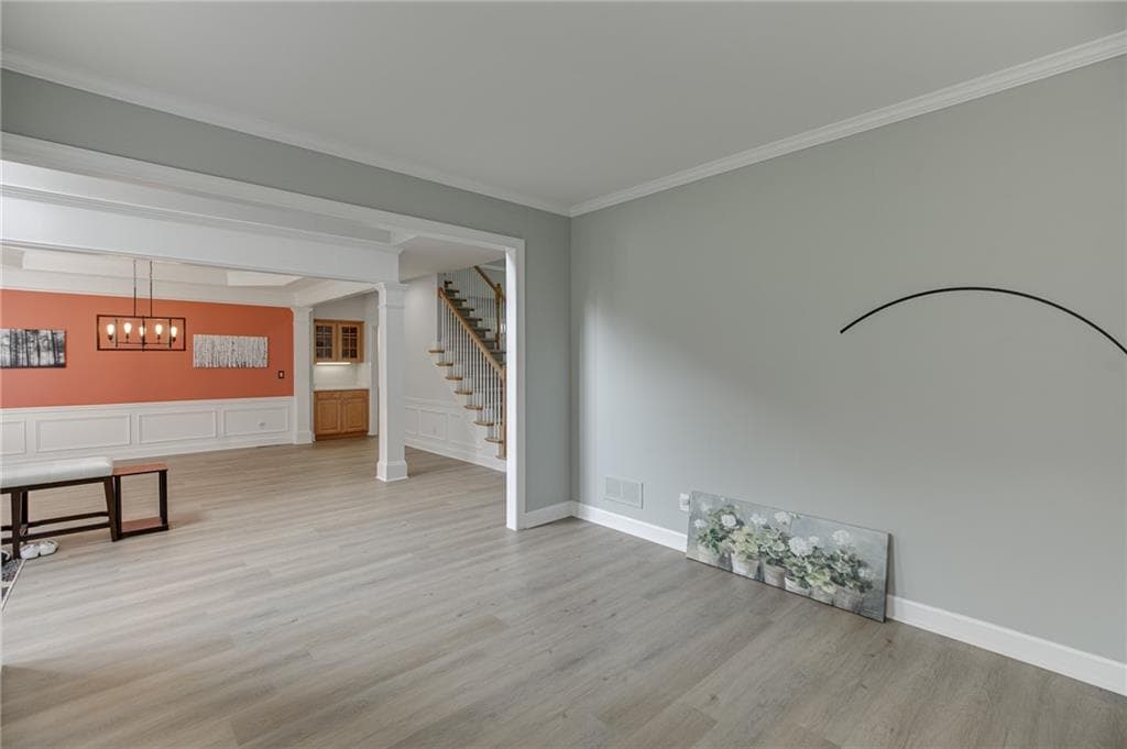 7 bedroom, 5 bathroom, 5,152 sq ft single family residence for sale at 1620 Alvecote Court, Cumming, GA 30041 — photo 6