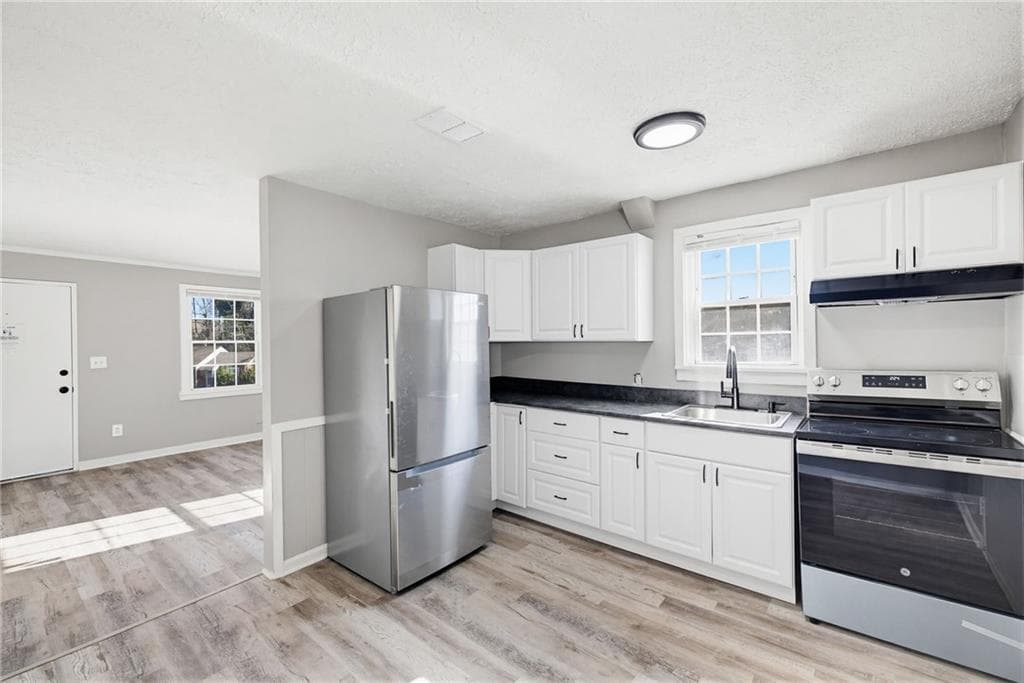 4 bedroom, 2 bathroom, 1,400 sq ft single family residence for sale at 1789 Cahoon Street, Atlanta, GA 30310 — photo 5