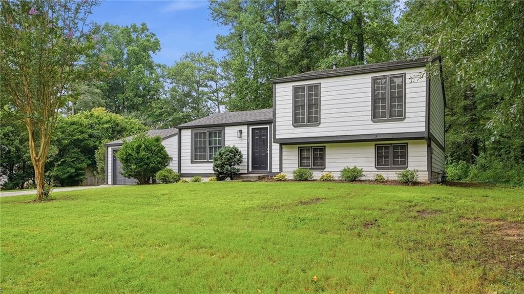 4 bedroom, 2 bathroom, 1,560 sq ft single family residence for sale at 3569 Oak Knoll Drive, Marietta, GA 30068 — photo 2