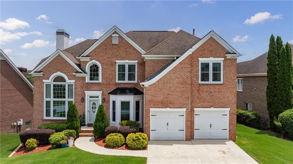 5 bedroom, 4 bathroom, 4,880 sq ft single family residence for sale at 3204 Clubside View Court, Snellville, GA 30039