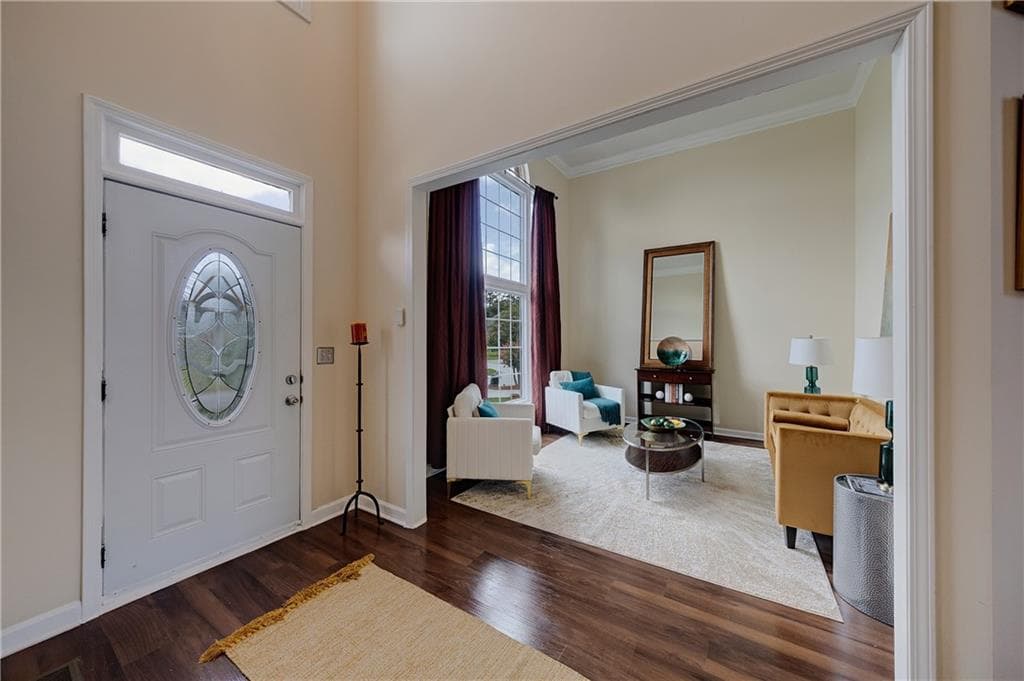 5 bedroom, 4 bathroom, 4,880 sq ft single family residence for sale at 3204 Clubside View Court, Snellville, GA 30039 — photo 2