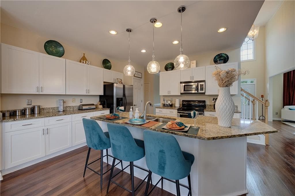 5 bedroom, 4 bathroom, 4,880 sq ft single family residence for sale at 3204 Clubside View Court, Snellville, GA 30039 — photo 8