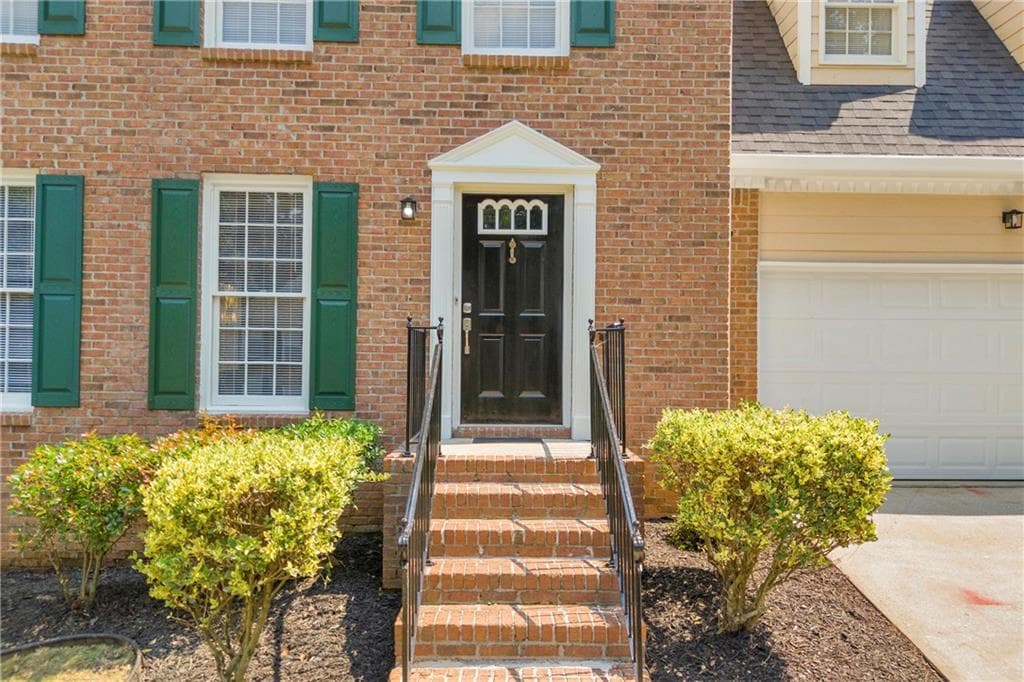 4 bedroom, 3 bathroom, 1,818 sq ft single family residence for sale at 1426 Emerald Pine Court, Lawrenceville, GA 30043 — photo 4