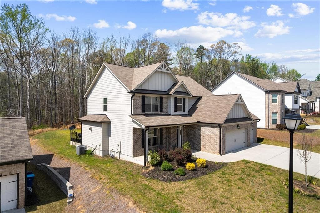 4 bedroom, 3 bathroom, 2,458 sq ft single family residence for sale at 3330 Elkhorn Ridge Run, Dacula, GA 30019 — photo 4