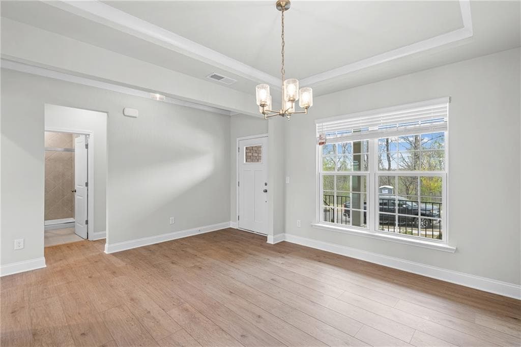 6 bedroom, 4 bathroom, 3,080 sq ft single family residence for sale at 4865 Rosarian Drive, Cumming, GA 30040 — photo 4