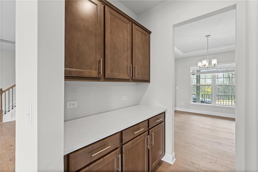 6 bedroom, 4 bathroom, 3,080 sq ft single family residence for sale at 4865 Rosarian Drive, Cumming, GA 30040 — photo 10