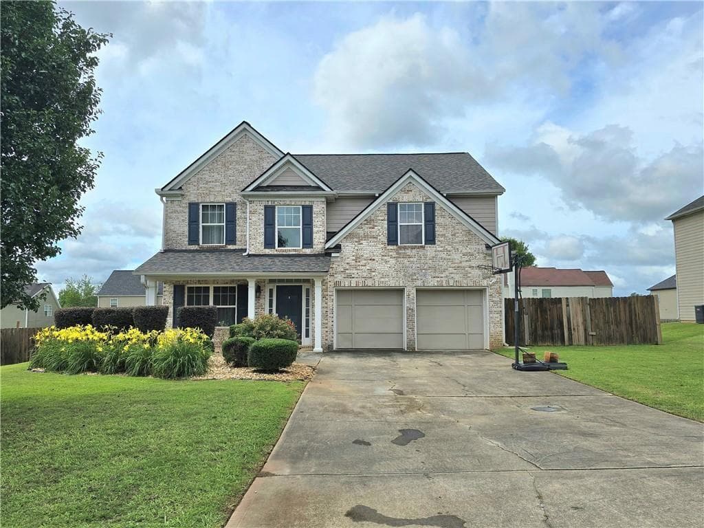 4 bedroom, 3 bathroom single family residence for rent at 227 Happy Trail, Locust Grove, GA 30248 for $2,500 a month — photo 1 of 13