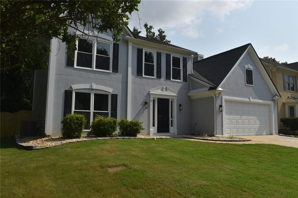 4 bedroom, 3 bathroom, 2,176 sq ft single family residence for rent at 10680 Glenbarr Drive, Johns Creek, GA 30097 for $2,950 a month — photo 1 of 22