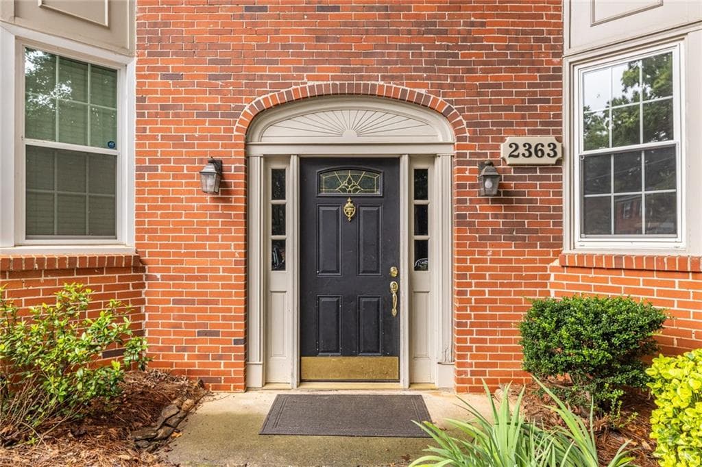 3 bedroom, 2 bathroom, 1,452 sq ft condominium for sale at 2363 Henderson Mill Road 7, Atlanta, GA 30345 — photo 1 of 24