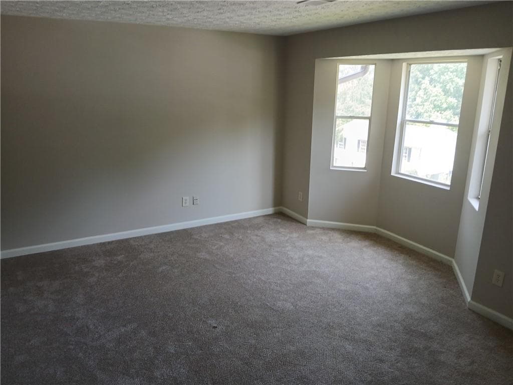 3 bedroom, 2 bathroom, 1,074 sq ft single family residence for sale at 2275 Ramblewood Circle, Decatur, GA 30035 — photo 2