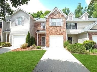 2 bedroom, 3 bathroom, 1,524 sq ft townhouse for rent at 1587 River Main Court, Lawrenceville, GA 30046 for $1,795 a month — photo 1 of 26