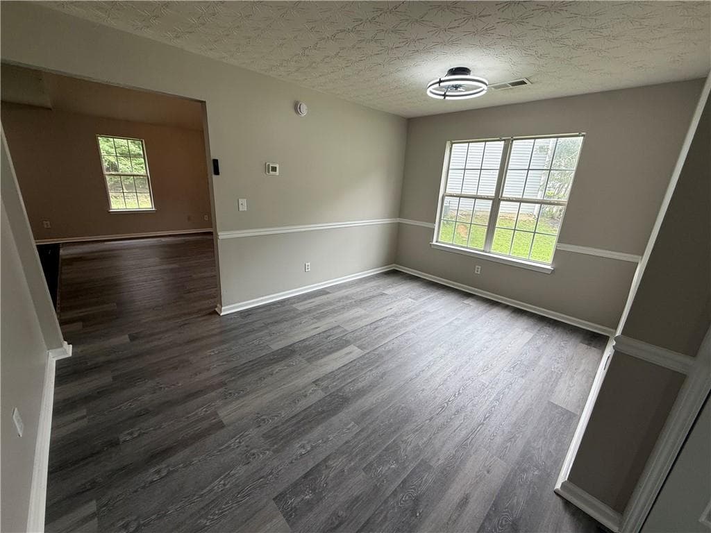 4 bedroom, 3 bathroom, 2,228 sq ft single family residence for sale at 1023 Quail Hunt Drive, Riverdale, GA 30296 — photo 2