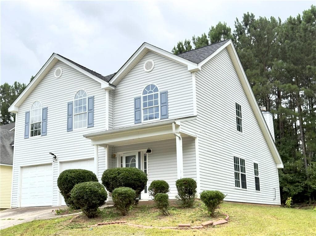 4 bedroom, 3 bathroom, 2,228 sq ft single family residence for sale at 1023 Quail Hunt Drive, Riverdale, GA 30296 — photo 1 of 13