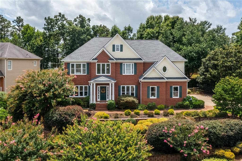 7 bedroom, 4 bathroom, 4,727 sq ft single family residence for sale at 2630 Stonehill Drive, Cumming, GA 30041