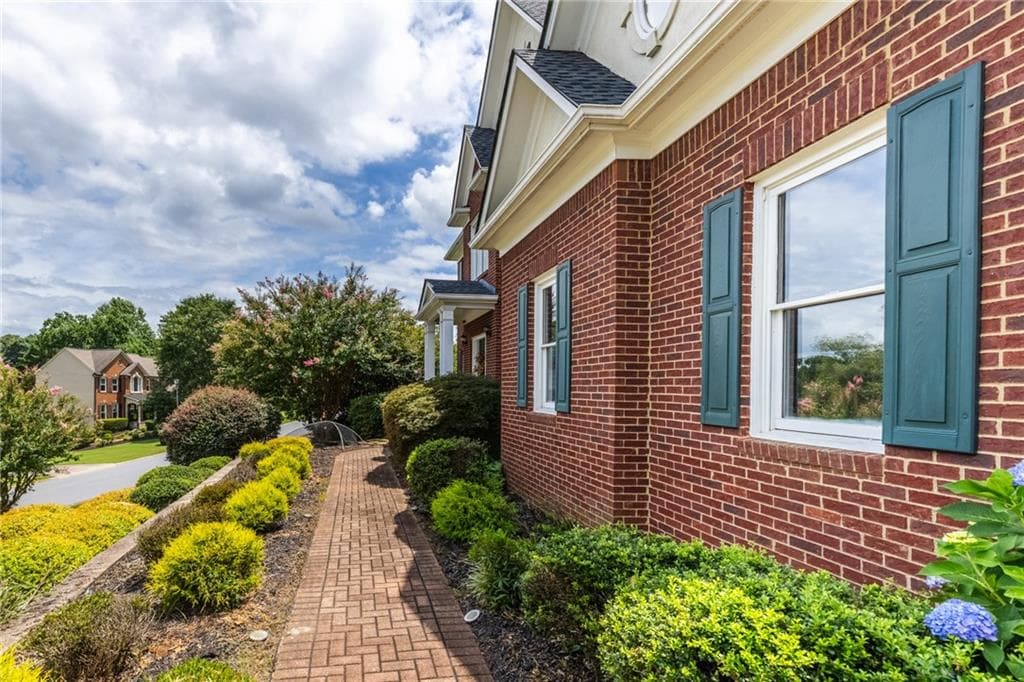 7 bedroom, 4 bathroom, 4,727 sq ft single family residence for sale at 2630 Stonehill Drive, Cumming, GA 30041 — photo 3