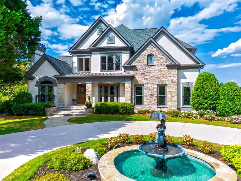 6 bedroom, 7 bathroom, 7,189 sq ft single family residence for sale at 5925 Stoneleigh Drive, Suwanee, GA 30024 — photo 2