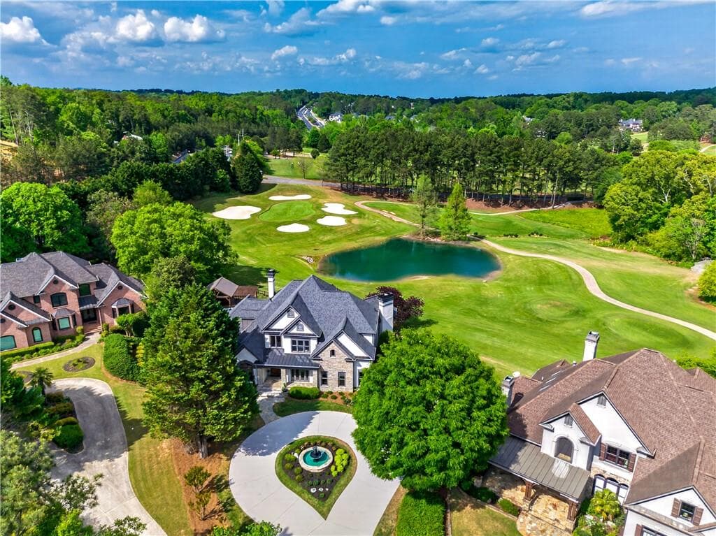 6 bedroom, 7 bathroom, 7,189 sq ft single family residence for sale at 5925 Stoneleigh Drive, Suwanee, GA 30024 — photo 3