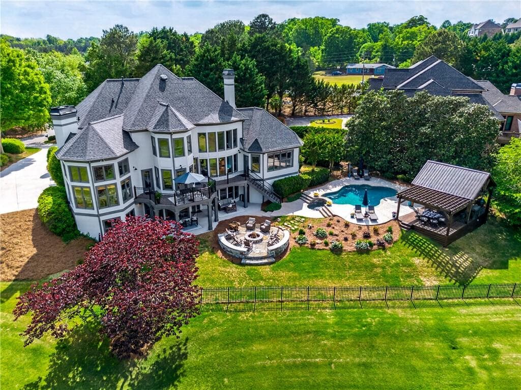6 bedroom, 7 bathroom, 7,189 sq ft single family residence for sale at 5925 Stoneleigh Drive, Suwanee, GA 30024 — photo 5