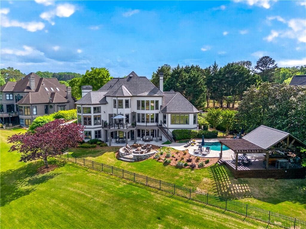 6 bedroom, 7 bathroom, 7,189 sq ft single family residence for sale at 5925 Stoneleigh Drive, Suwanee, GA 30024 — photo 6