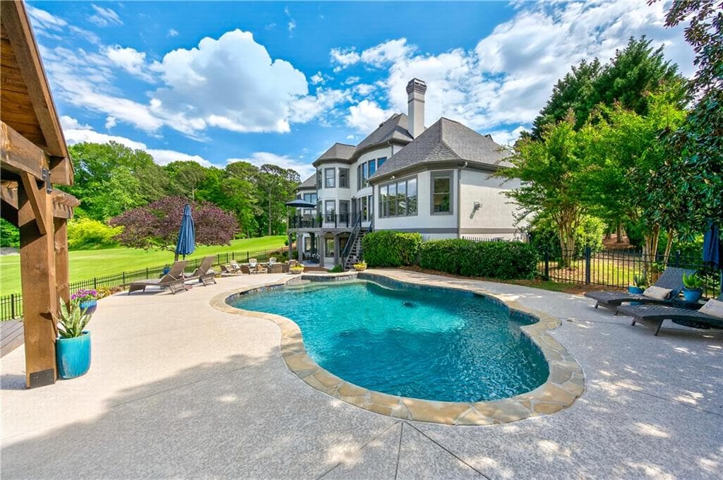 6 bedroom, 7 bathroom, 7,189 sq ft single family residence for sale at 5925 Stoneleigh Drive, Suwanee, GA 30024 — photo 8