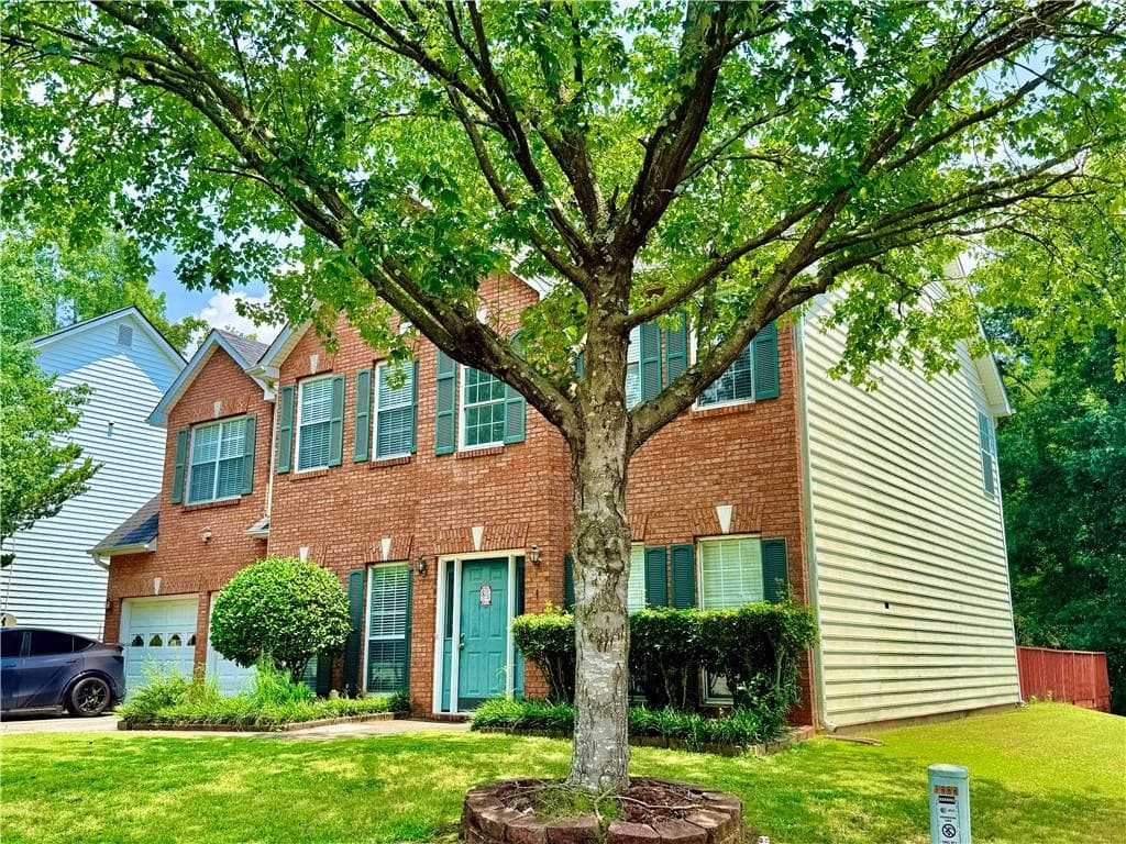 4 bedroom, 3 bathroom, 2,340 sq ft single family residence for sale at 1060 Charter Club Drive, Lawrenceville, GA 30043 — photo 2