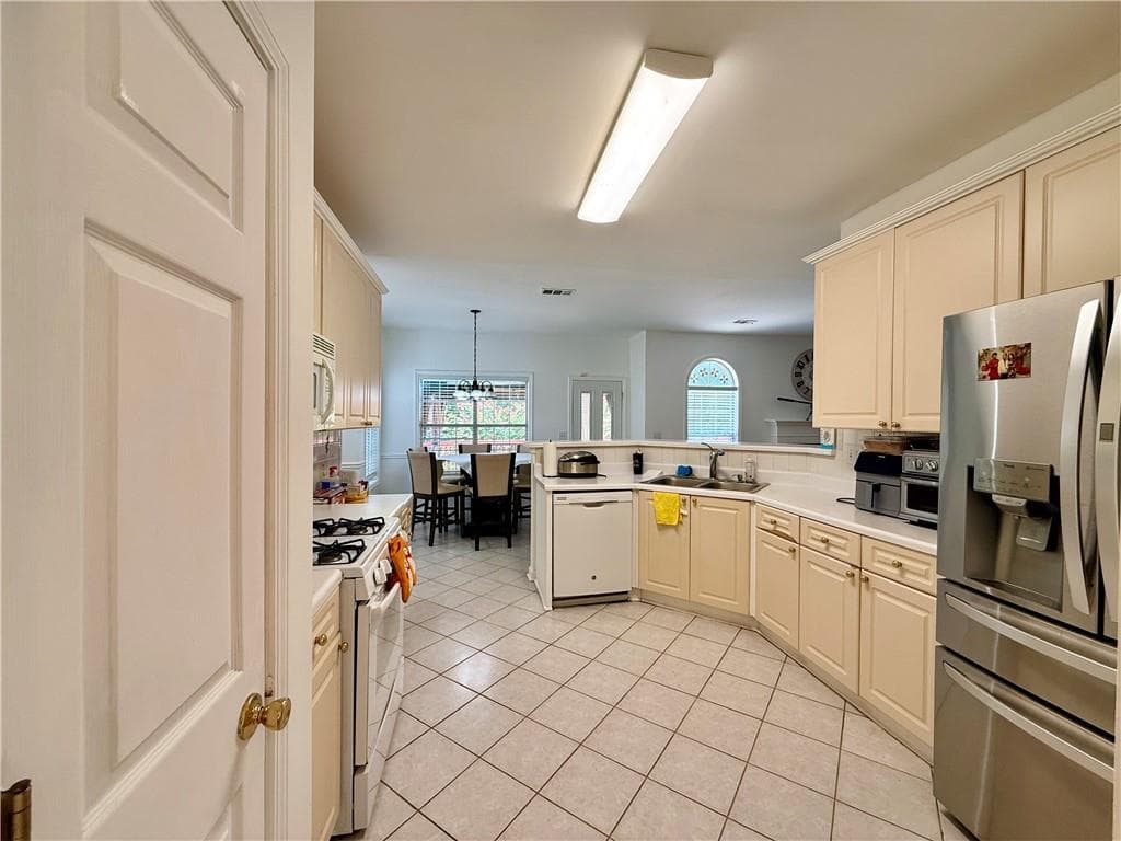 4 bedroom, 3 bathroom, 2,340 sq ft single family residence for sale at 1060 Charter Club Drive, Lawrenceville, GA 30043 — photo 9