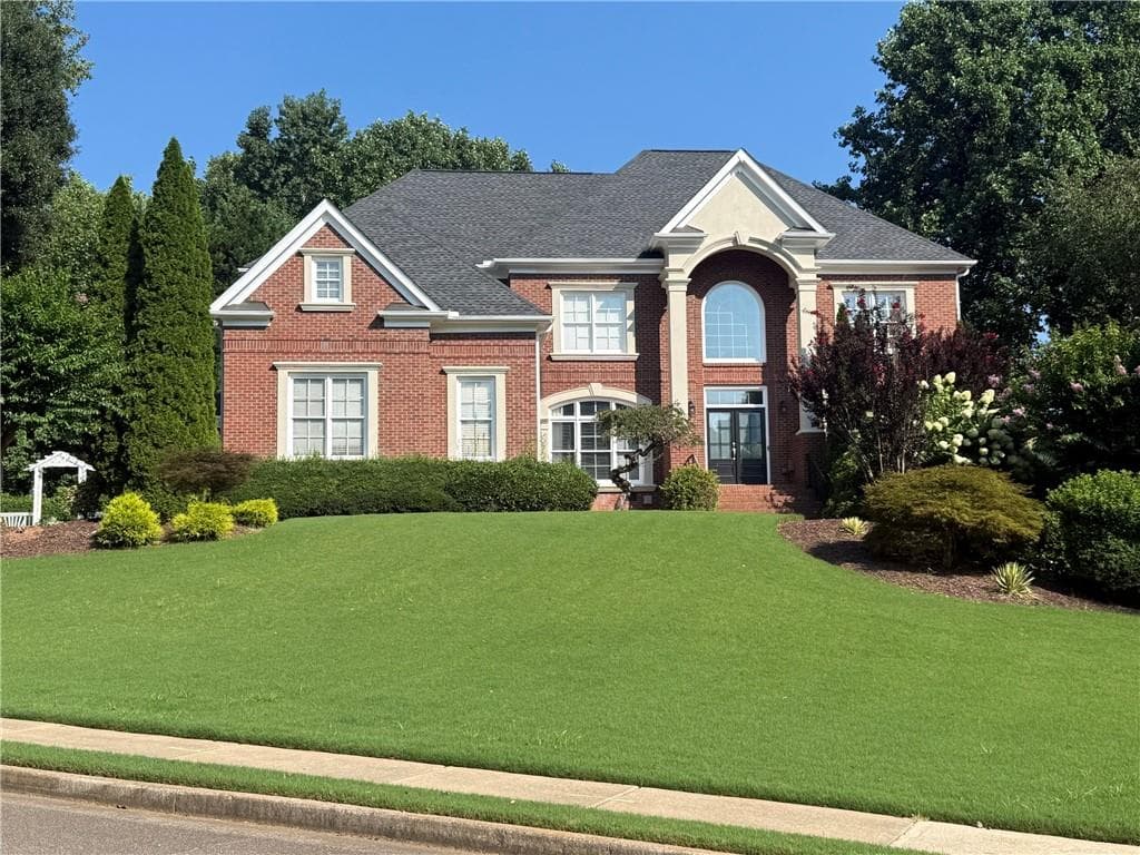6 bedroom, 7 bathroom, 6,420 sq ft single family residence for sale at 2120 Falling Water Court, Cumming, GA 30041