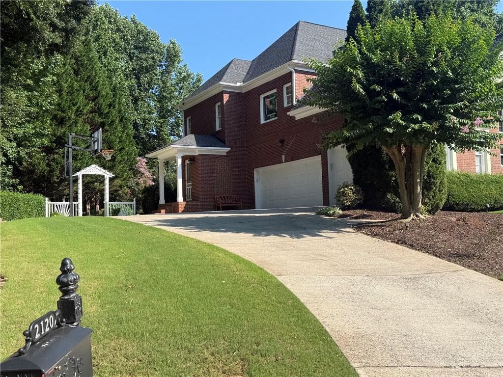 6 bedroom, 7 bathroom, 6,420 sq ft single family residence for sale at 2120 Falling Water Court, Cumming, GA 30041 — photo 3