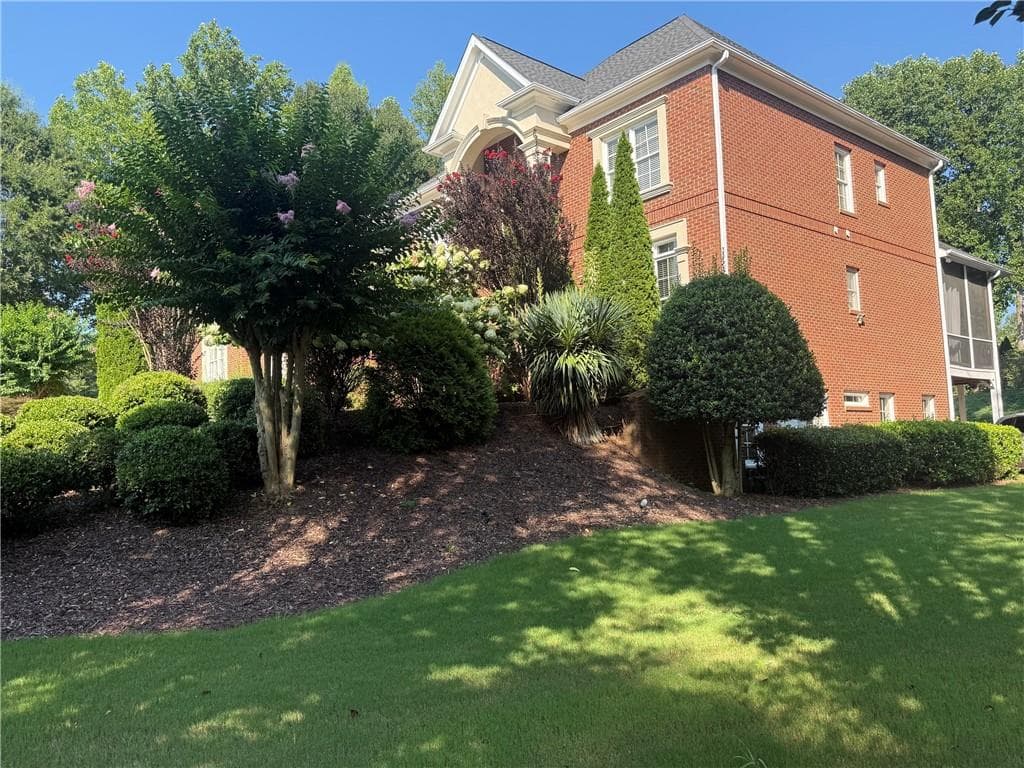 6 bedroom, 7 bathroom, 6,420 sq ft single family residence for sale at 2120 Falling Water Court, Cumming, GA 30041 — photo 4