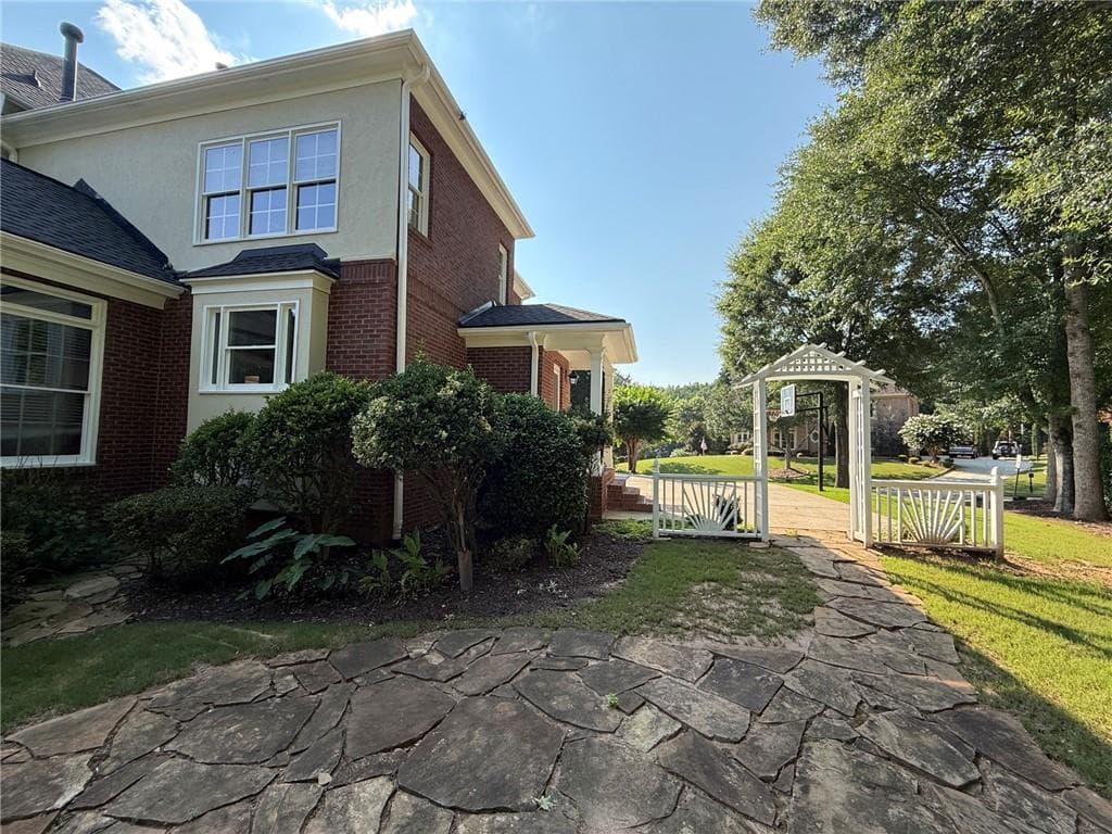 6 bedroom, 7 bathroom, 6,420 sq ft single family residence for sale at 2120 Falling Water Court, Cumming, GA 30041 — photo 7