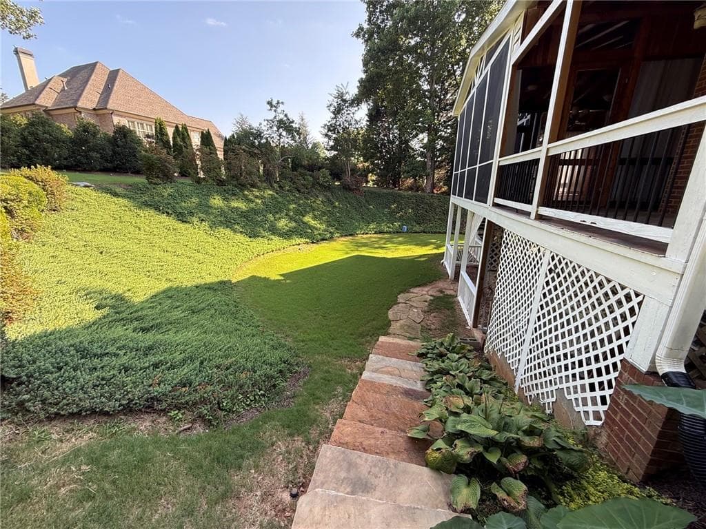 6 bedroom, 7 bathroom, 6,420 sq ft single family residence for sale at 2120 Falling Water Court, Cumming, GA 30041 — photo 8