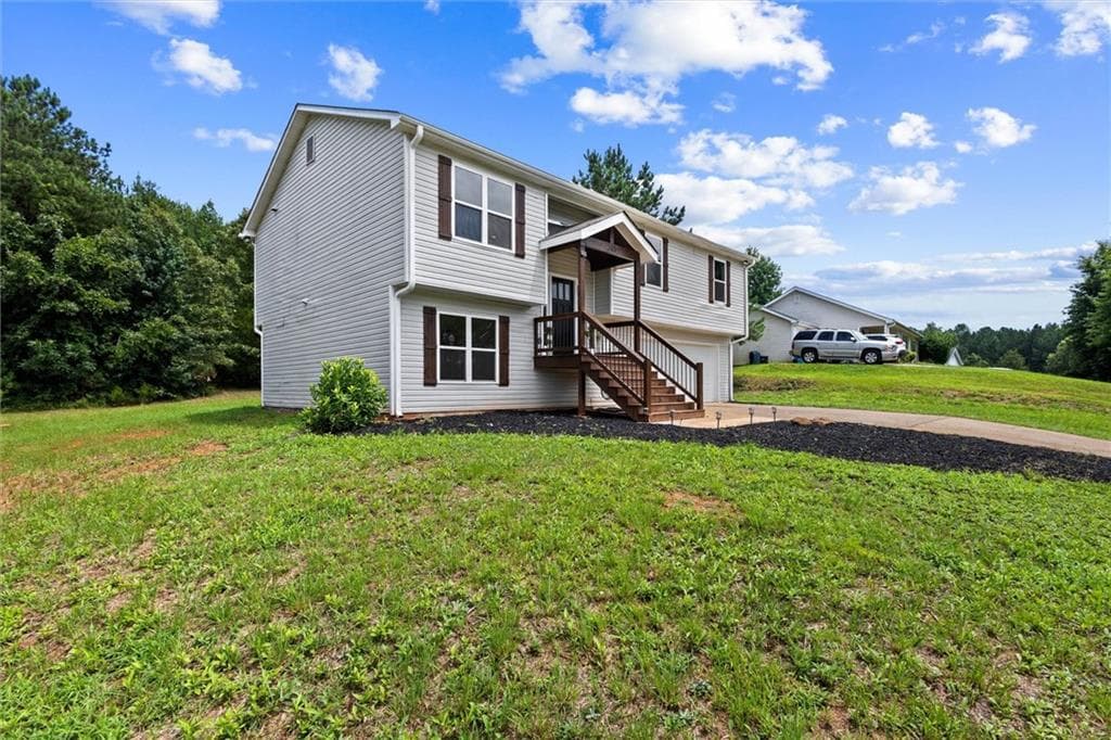 5 bedroom, 2 bathroom, 1,711 sq ft single family residence for sale at 305 Hunters Trace, Covington, GA 30014 — photo 3