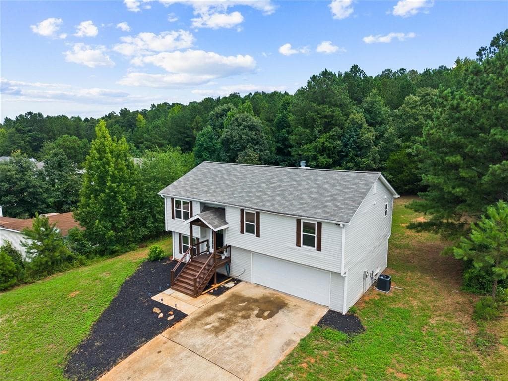 5 bedroom, 2 bathroom, 1,711 sq ft single family residence for sale at 305 Hunters Trace, Covington, GA 30014 — photo 5