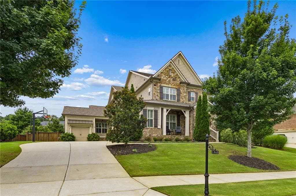 5 bedroom, 6 bathroom, 5,215 sq ft single family residence sold at 1045 Etris Manor Drive, Roswell, GA 30075