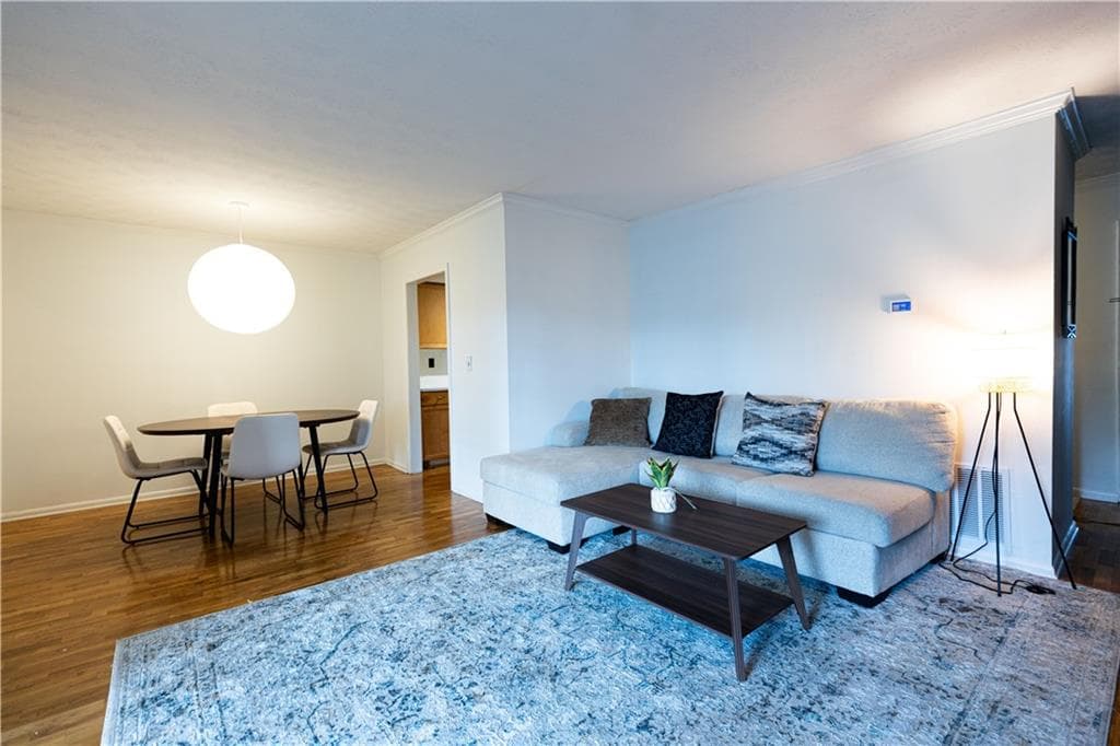 1 bedroom, 1 bathroom, 794 sq ft condominium for sale at 1150 Collier Road 11I, Atlanta, GA 30318 — photo 1 of 30