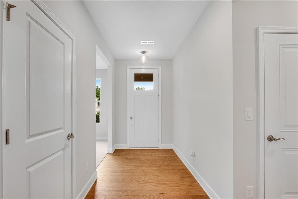 3 bedroom, 2 bathroom, 2,227 sq ft single family residence for sale at 1769 Rowland Pass, Buford, GA 30518 — photo 4