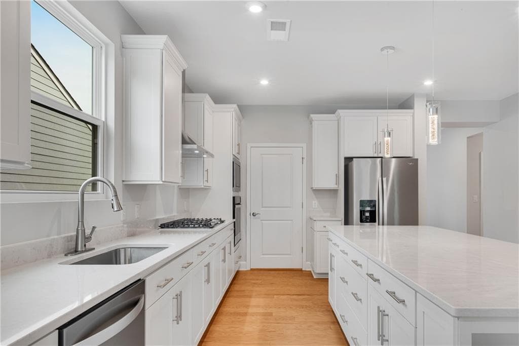 3 bedroom, 2 bathroom, 2,227 sq ft single family residence for sale at 1769 Rowland Pass, Buford, GA 30518 — photo 8