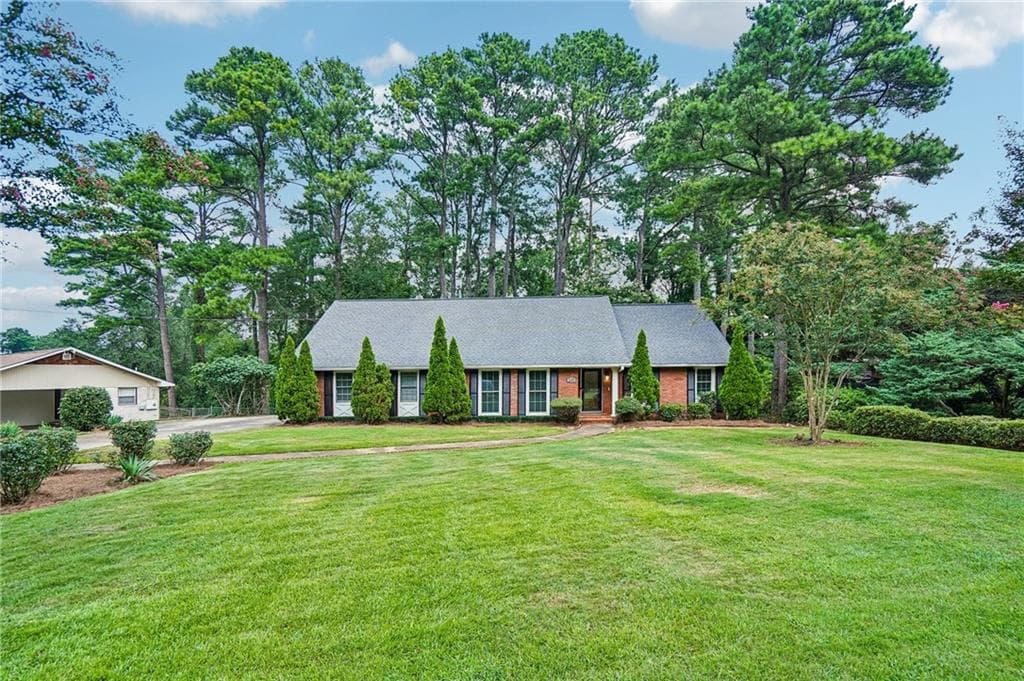 5 bedroom, 3 bathroom, 3,949 sq ft single family residence for sale at 2615 Skyline Drive, Atlanta, GA 30337 — photo 1 of 26