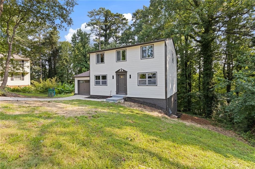 3 bedroom, 3 bathroom, 1,560 sq ft single family residence for sale at 5420 Robin Hill Court, Norcross, GA 30093 — photo 2