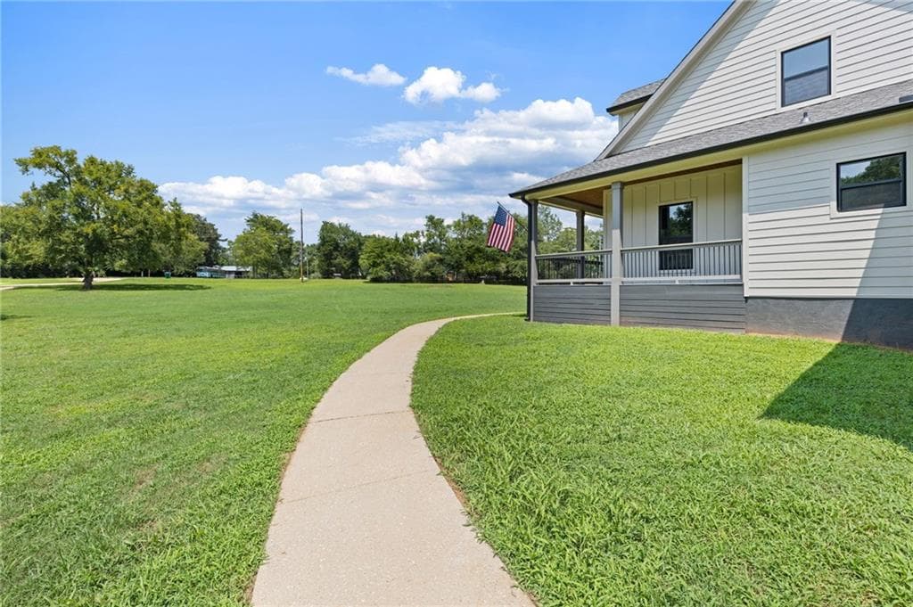 4 bedroom, 5 bathroom, 4,932 sq ft single family residence for sale at 496 Davis Road, Jefferson, GA 30549 — photo 3