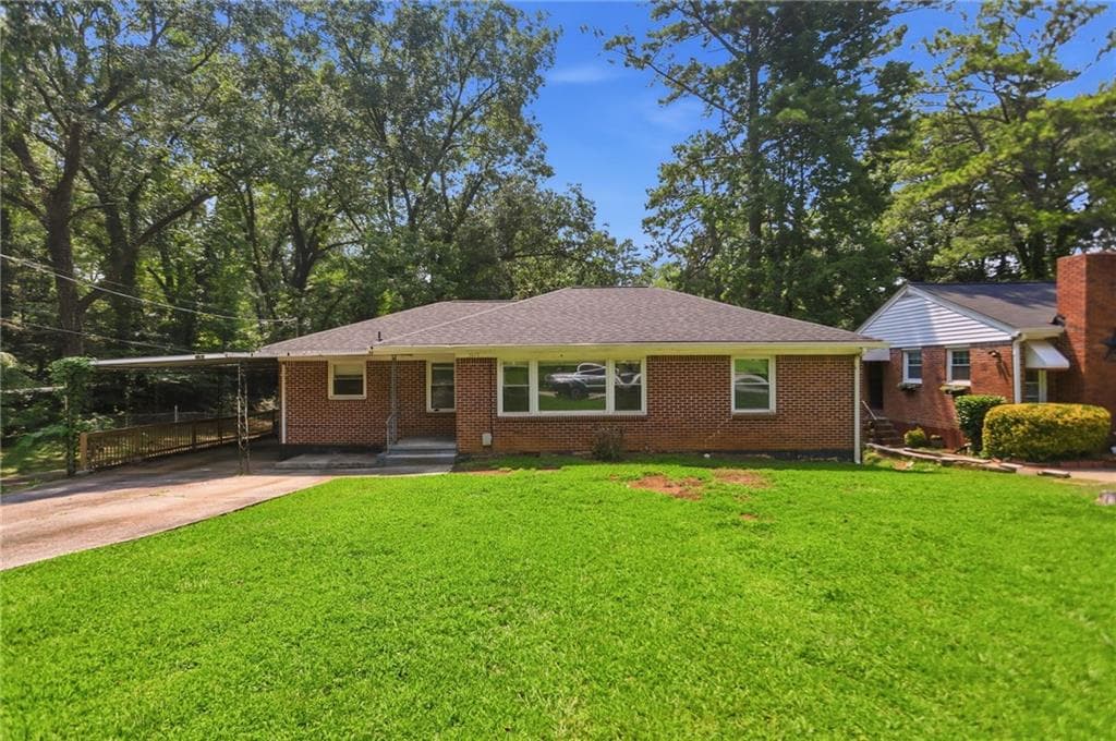 3 bedroom, 2 bathroom, 1,440 sq ft single family residence for sale at 2651 Plantation Drive, East Point, GA 30344 — photo 1 of 31