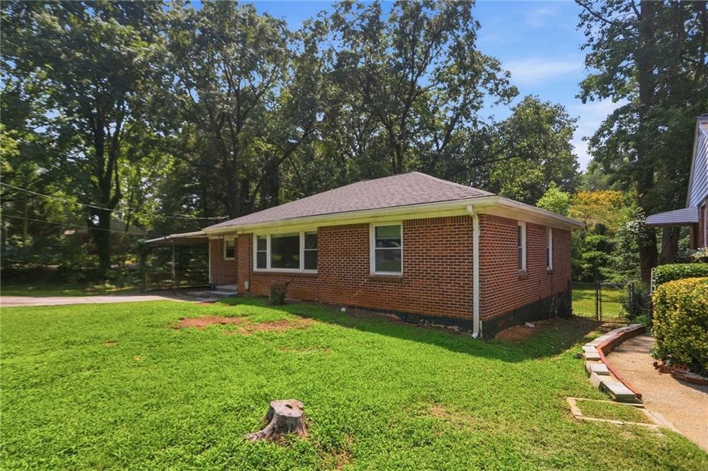 3 bedroom, 2 bathroom, 1,440 sq ft single family residence for sale at 2651 Plantation Drive, East Point, GA 30344 — photo 3